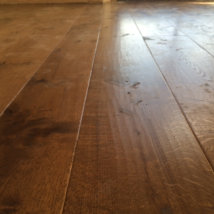 A close up detail of the Generations hand plained rich tutor finished flooring.